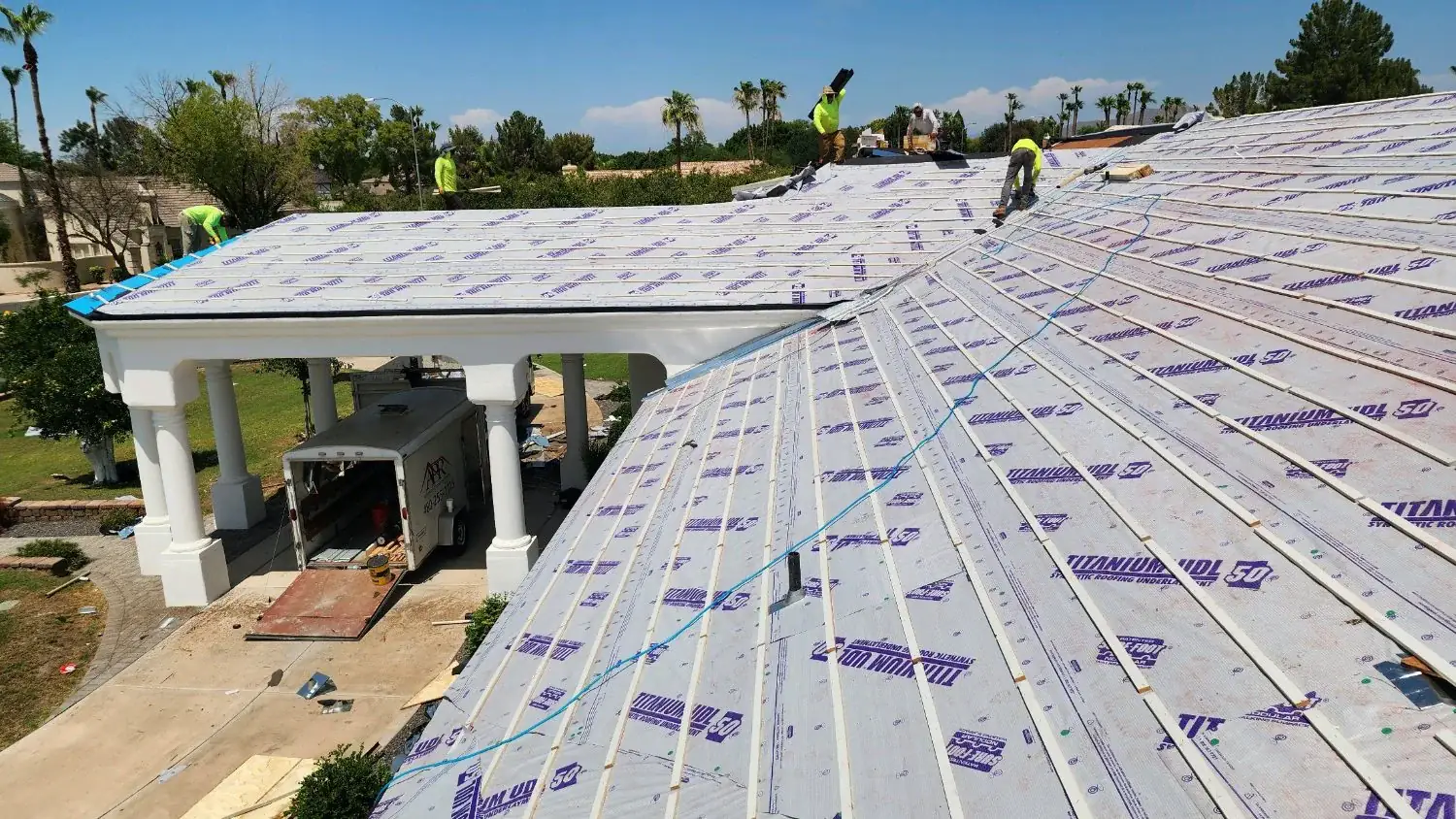 New underlayment installed across a large tile roof